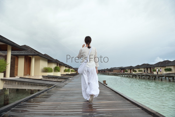 Young woman relax on cloudy summer day and bad weather, stock photo