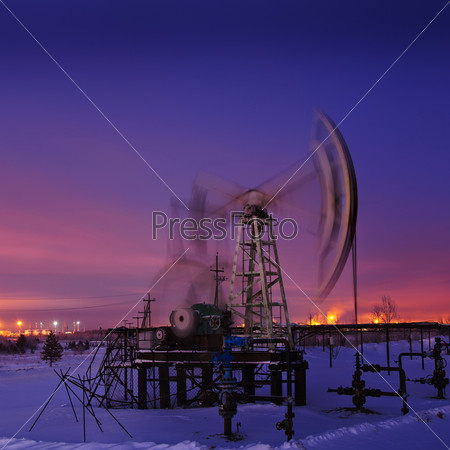 Oil rig at night.