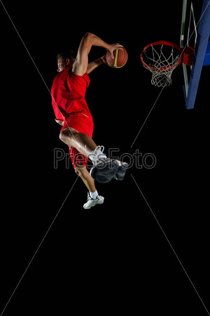 Basketball game sport player in action isolated on black background, stock photo