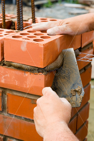 Construction. Bricks laying.