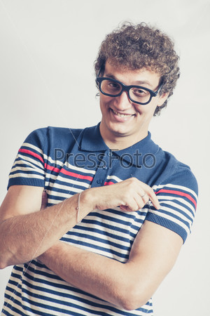 Funny head shot of curly hair man smiling