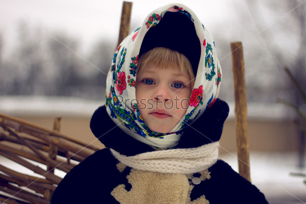 Baby girl\'s portrait in old russian style with pavlovsky posad shawls