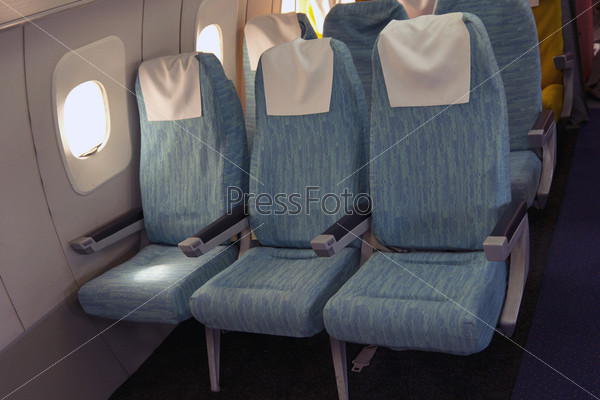 Comfortable seats in aircraft cabin Tu-144, stock photo