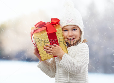 beauty childl with christmas gift