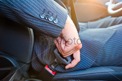 Driver In Business Suit Fastens His Seat Himself Automobile Seat Belt