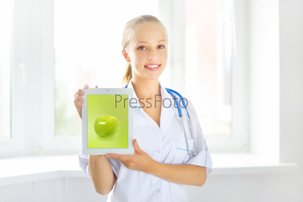 Female doctor with tablet pc