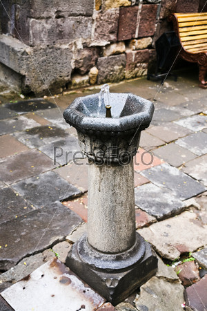 drinking fountain in medieval monastery in Armenia