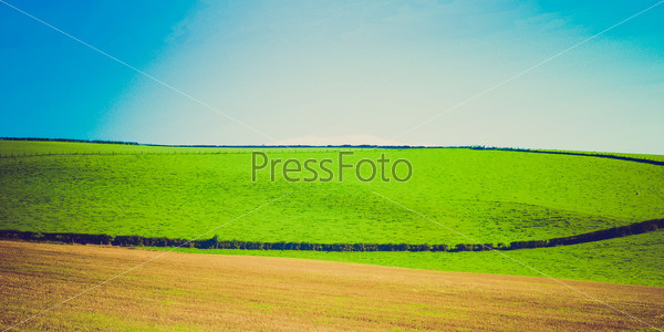 Retro looking Panoramic landscape view of Cardross hills near Glasgow in Scotland