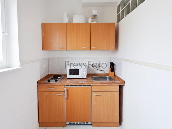 Small kitchen with furniture set