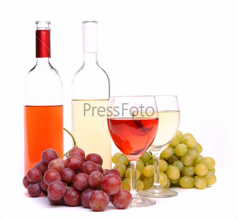 Two glasses, two bottles of wine and grapes on the white bsckground