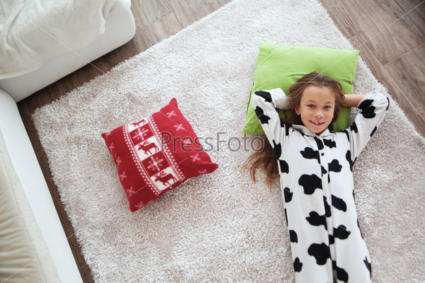 Child in cow print pajamas