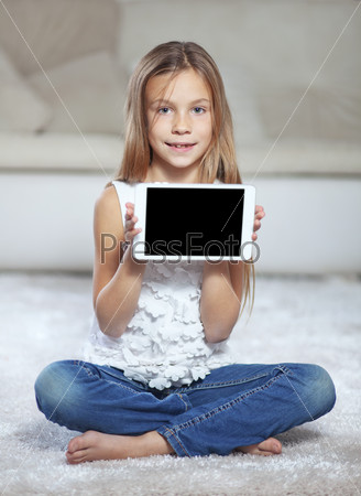 Child playing on tablet pc