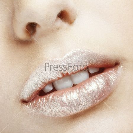 Close-up shot of female face with lips makeup