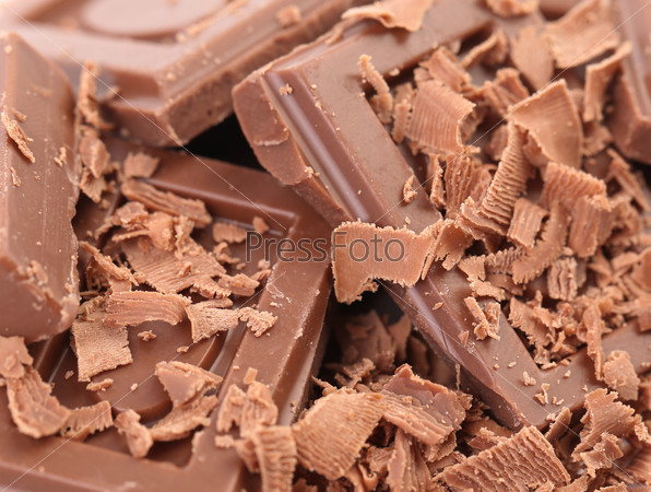 Close up of chocolate pieces. Whole background, stock photo
