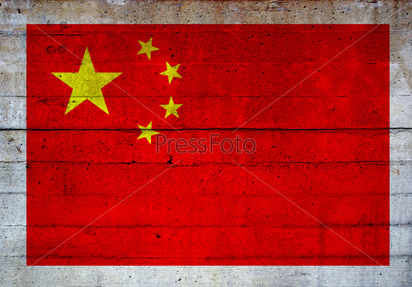 Flag of China over concrete wall background