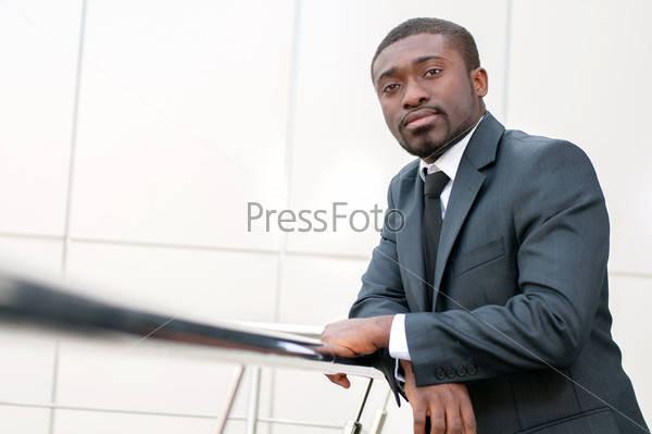 Portrait of a successful African American business man at the office building