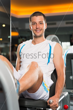 Young man training calf muscles