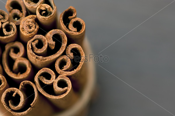 Bunch of cinnamon bark (sticks) close up, background