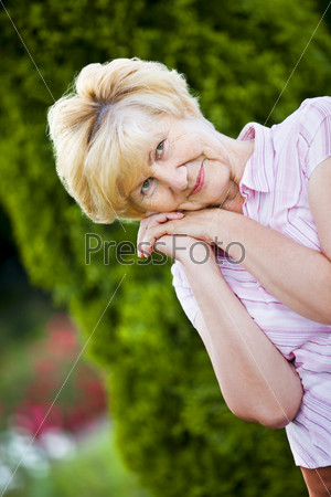 Dreaminess. Outdoor Portrait of Pensive Granny