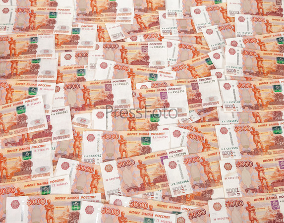 Heap of five thousand russian rubles banknotes as background