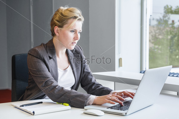 Executive business woman with notebook