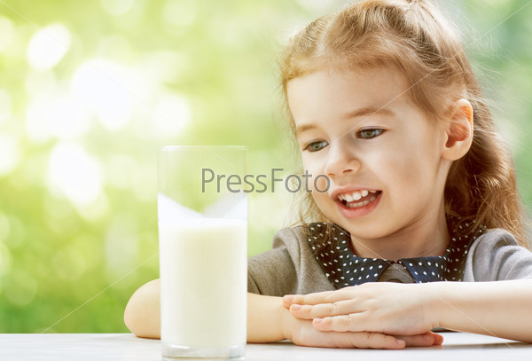 a girl drinking fresh milk