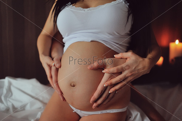 Tummy of a pregnant girl