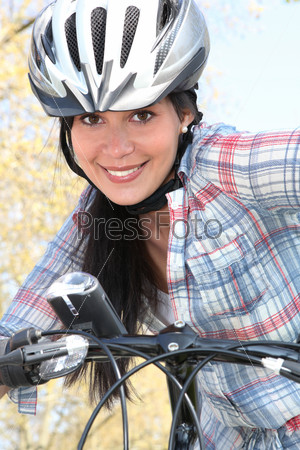 Young woman on a bike