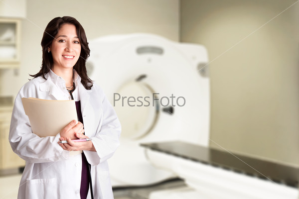 Female doctor radiologist at CT CAT scan with chart