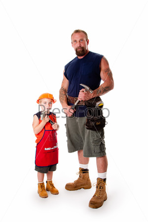 Caucasian middle aged father and cute young son ready to do a construction job. Man and boy wearing tool belt and holding hammers, wearing shorts and boots, standing, isolated.