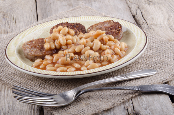 baked beans and fried white pudding on a plate