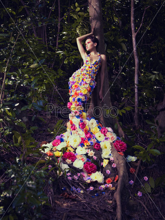 Blooming Gorgeous Lady In A Dress Of Flowers In The Rainforest