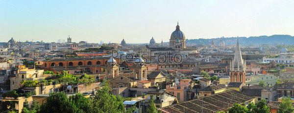 Panoramic colorful view of Rome at sunset. Italy