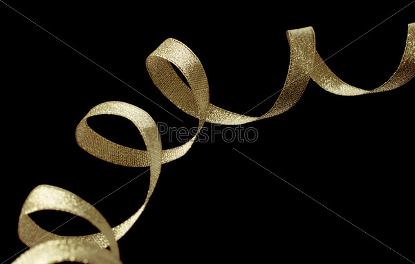 Gold ribbon ribbon on black background