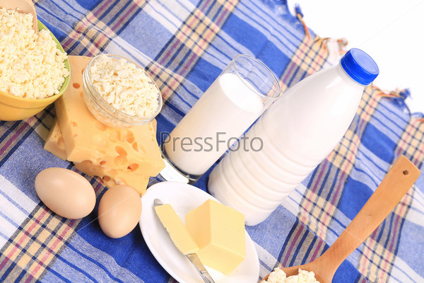 close up of Composition with bread milk and cheese. Isolated on white background.