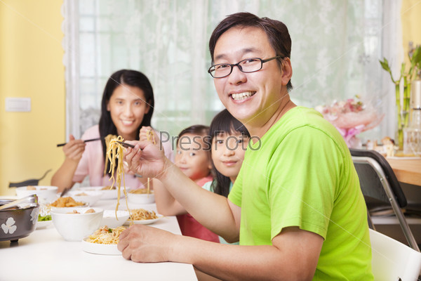 happy  Family  Eating noodles at home