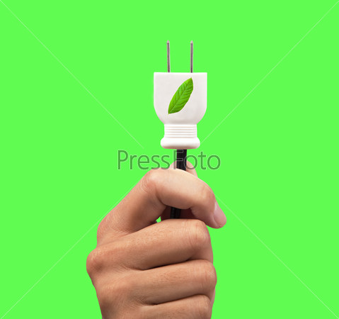 hand holding eco power plug and leaf logo with green background