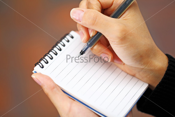 Pen in hand writing