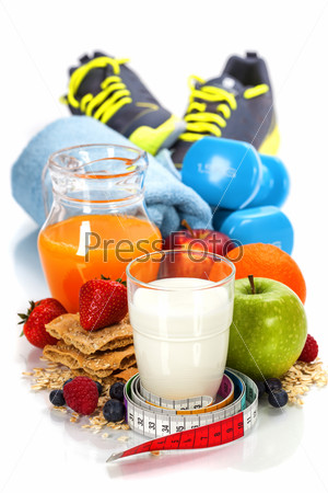 Different tools for sport and diet food  on white background - sport, health and diet concept