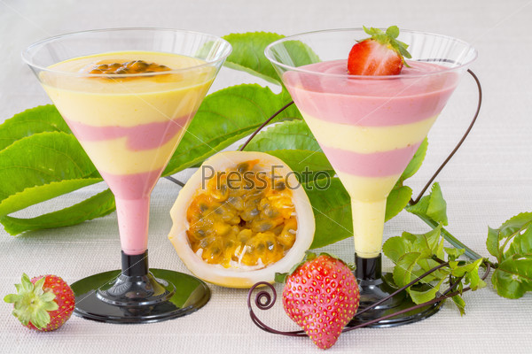 Passion fruit and strawberry mousse. Horizontal composition