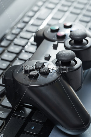 Electronic devices. Laptop with joystick, stock photo