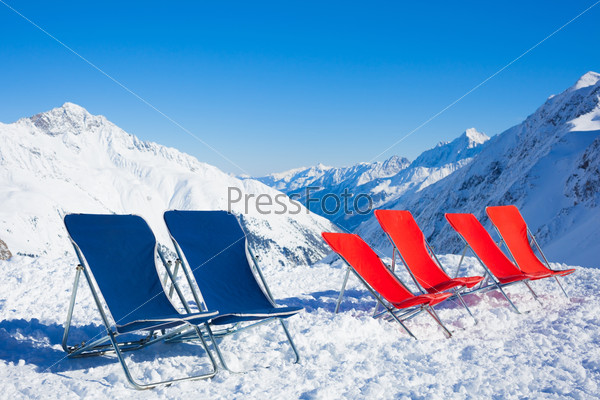 Six chairs on top of mountain