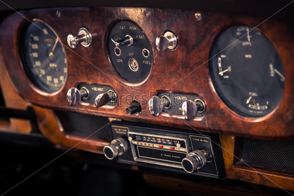 Dashboard in interior of old vintage or retro car or automobile, stock photo