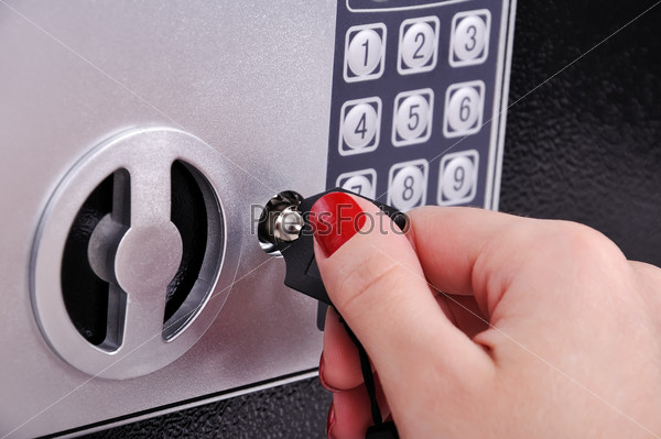 hand opened a key safe