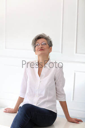 Elderly. Happy woman at home