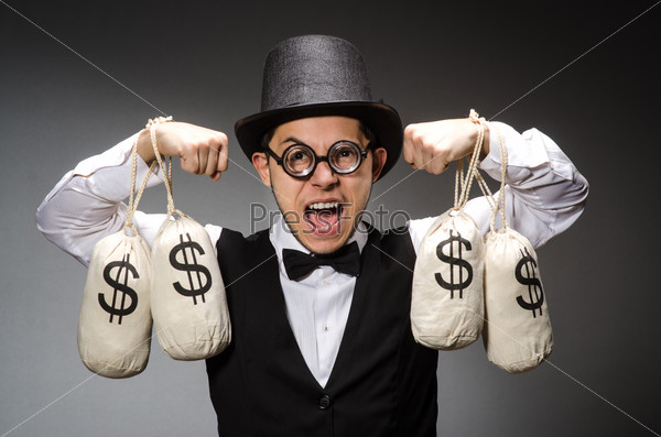 Man with sacks of money, stock photo