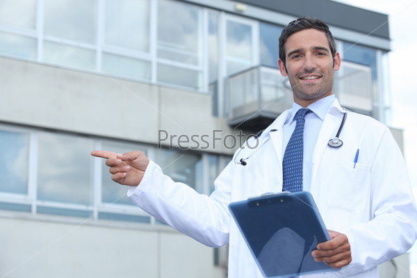 Doctor pointing outside