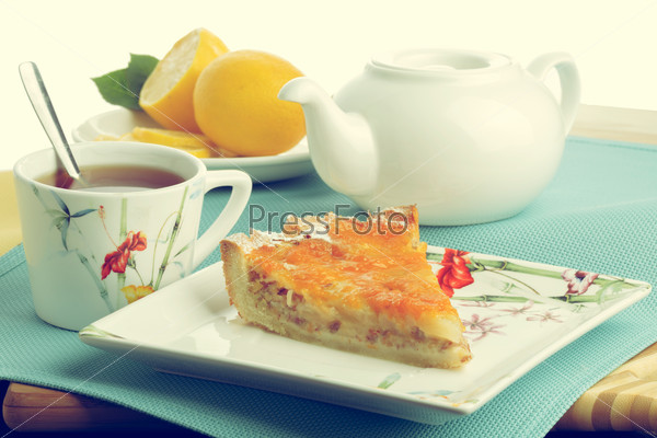 Cake slice with tea. Healthy breakfast. Vintage look.