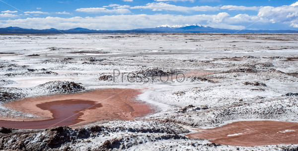 Salinas Grandes on Argentina Andes is a salt desert in the Jujuy Province. It is of industrial importance for its sodium and potassium mines. Salar de Uyuni is also located in the same region