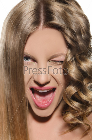 Young woman with cold hairdo made grimace